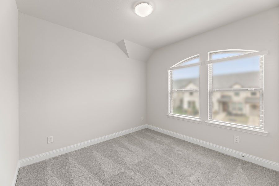 Representative exterior photo of a completed home built from the Buchanan by Impression Homes in Timber Ridge, Corinth, TX (Image 22). Representative exterior photo of a completed home built from the Buchanan by Impression Homes in Timber Ridge, Corinth, TX (Image 22).