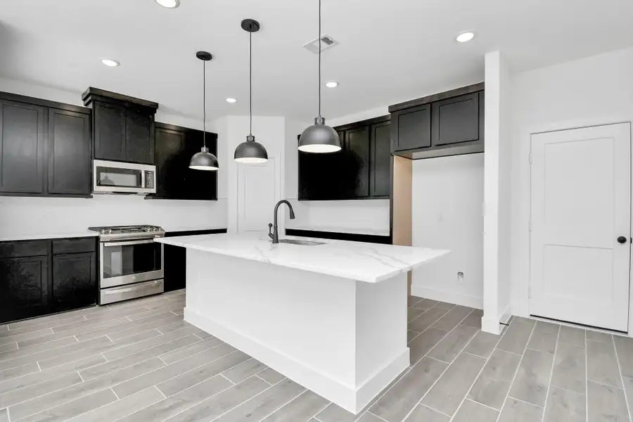 Furnished interior view inside a new home in Meridiana, Rosharon (Image 4).