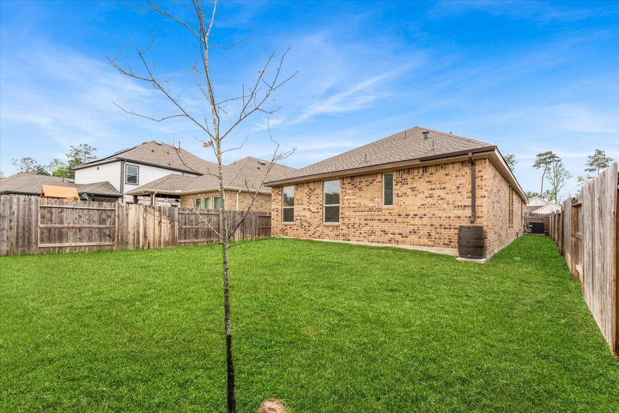 Exterior details and patio area of a home in , Conroe (Image 4). Exterior details and patio area of a home in , Conroe (Image 4).