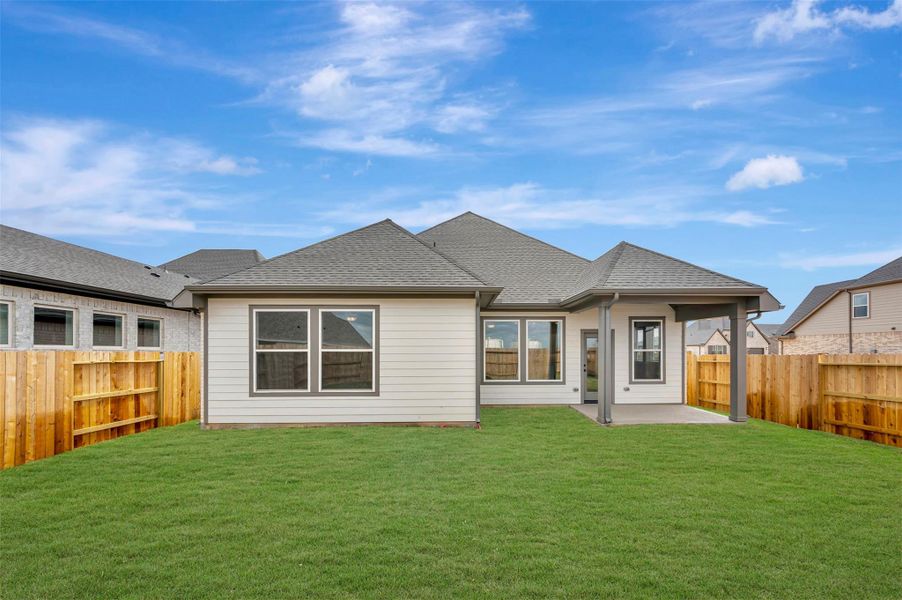 Exterior details and patio area of a home in The Grand Prairie 50’, Hockley (Image 16).