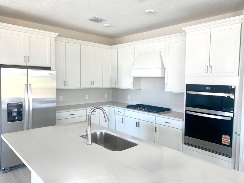 Furnished interior view inside a new home in Del Webb Tradition, Port St. Lucie (Image 11).
