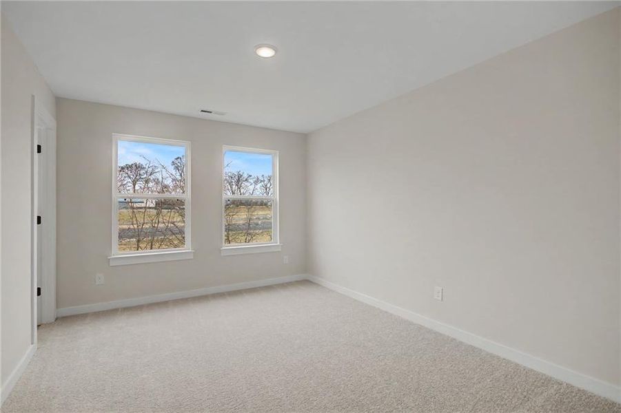 Spacious, unfurnished interior of a new home in The Park at Brighton, Locust Grove (Image 24).