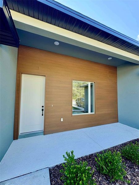 Front exterior of a new home in Marion Oaks, Ocala, FL, highlighting curb appeal (Image 16).