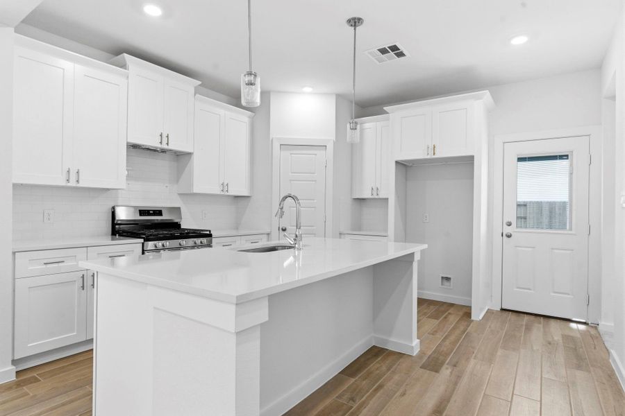 Furnished interior view inside a new home in , Iowa Colony (Image 15).
