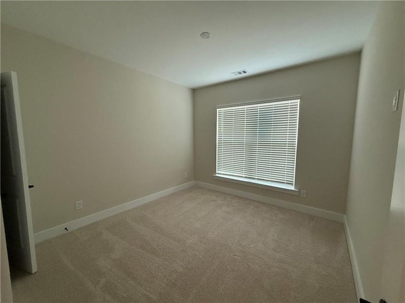 Spacious, unfurnished interior of a new home in Rose Creek, Cumming (Image 13).