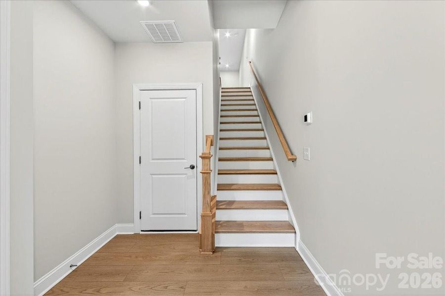 Foyer featuring oak box stairs with open rail Foyer featuring oak box stairs with open rail