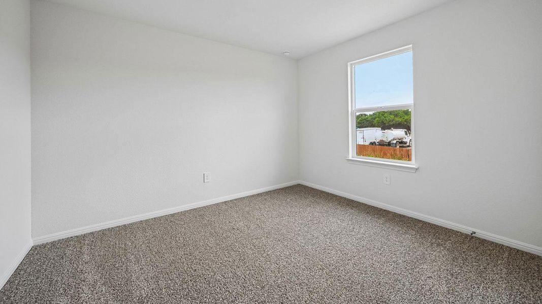 Spacious, unfurnished interior of a new home in Bar W Ranch, Leander (Image 25).