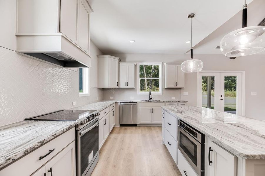 Furnished interior view inside a new home in LOVVORN ESTATES, Carrollton (Image 7).