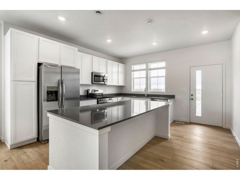 Furnished interior view inside a new home in Riano Ridge, Loveland (Image 6).
