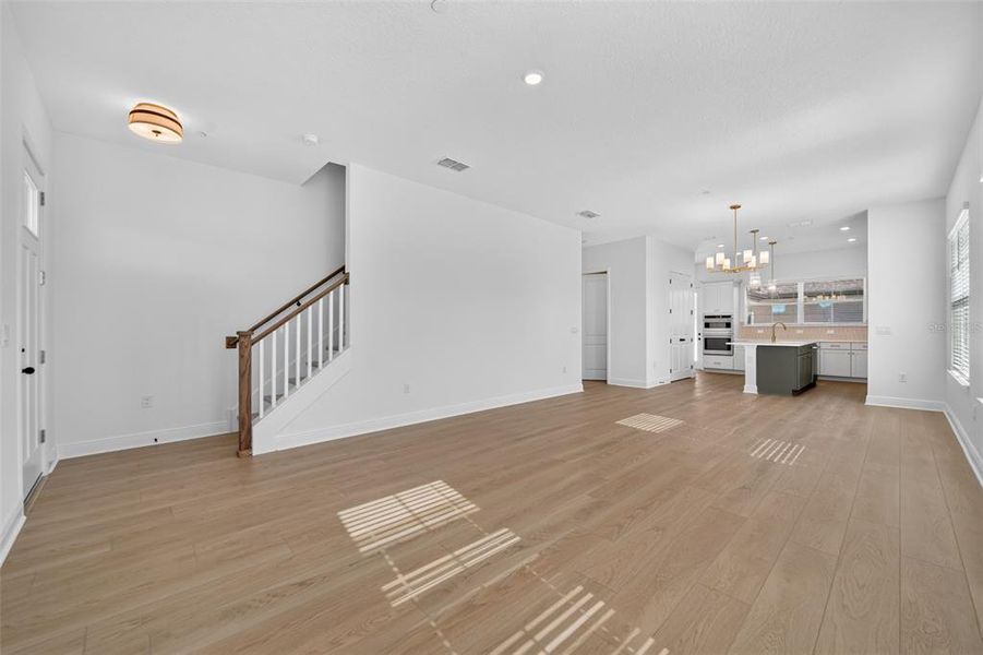 Spacious, unfurnished interior of a new home in Lake Cawood Cove, Windermere (Image 12).