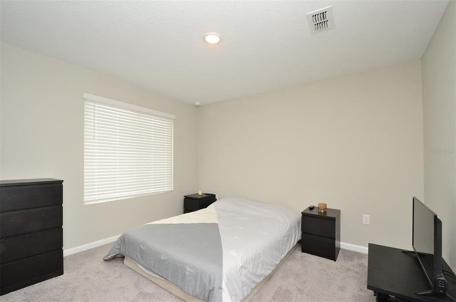 Furnished interior view inside a new home in Seasons at Eden Hills, Lake Alfred (Image 30).