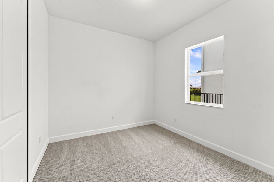 Spacious, unfurnished interior of a new home in Tradition, Port St. Lucie (Image 11).