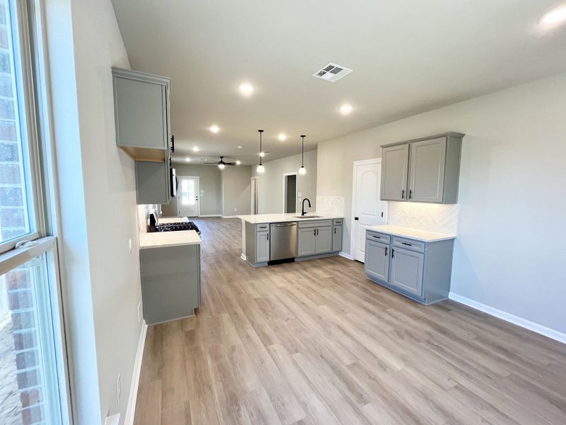 Front exterior of a new home in Emberly, Beasley, TX, highlighting curb appeal (Image 2).