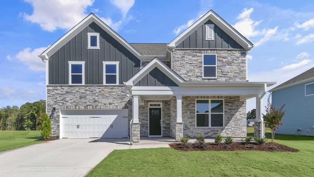 Representative exterior photo of a completed home built from the HARTWELL by D.R. Horton in Eagle Creek, Fuquay Varina, NC (Image 21).