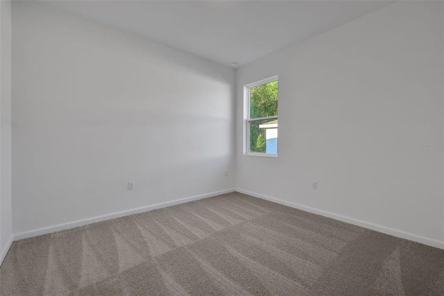 Spacious, unfurnished interior of a new home in Seaport Village, Tavares (Image 22).