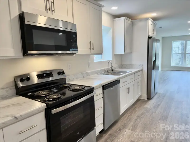 Furnished interior view inside a new home in , Oakboro (Image 5).