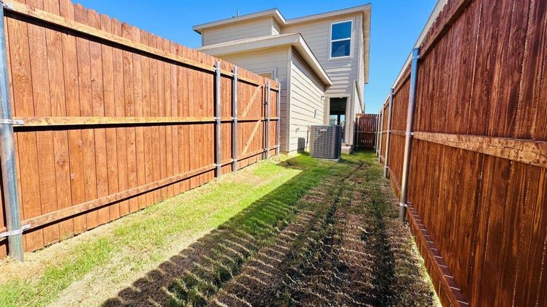 Exterior details and patio area of a home in Orchard Village, Fort Worth (Image 3). Exterior details and patio area of a home in Orchard Village, Fort Worth (Image 3).