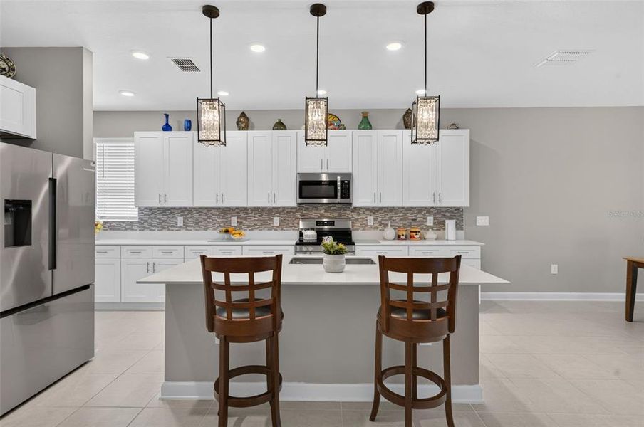 Furnished interior view inside a new home in Bronson's Ridge, Apopka (Image 14).