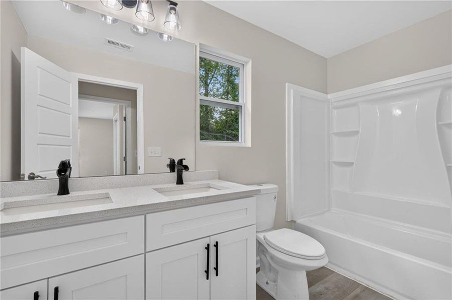 Furnished interior view inside a new home in , Jonesboro (Image 8).