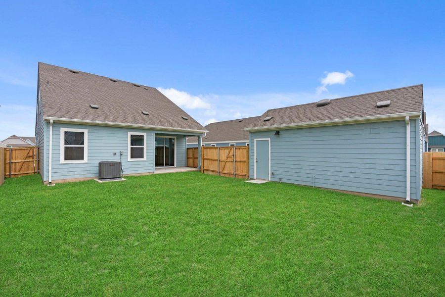 Rear of Home and Private Backyard