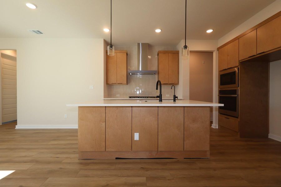 Furnished interior view inside a new home in Heritage, Dripping Springs (Image 6).