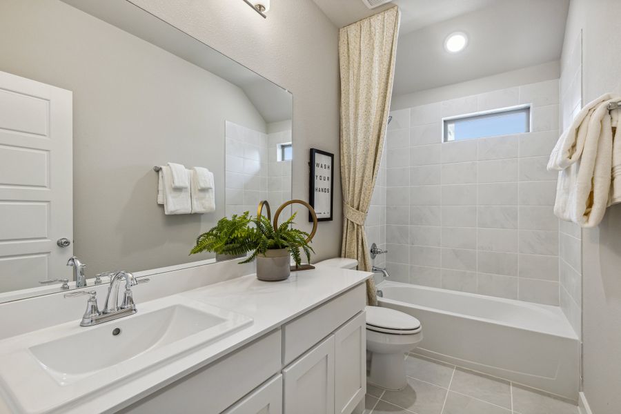 Bathroom in the Wimbledon home plan by Trophy Signature Homes – REPRESENTATIVE PHOTO Bathroom in the Wimbledon home plan by Trophy Signature Homes – REPRESENTATIVE PHOTO
