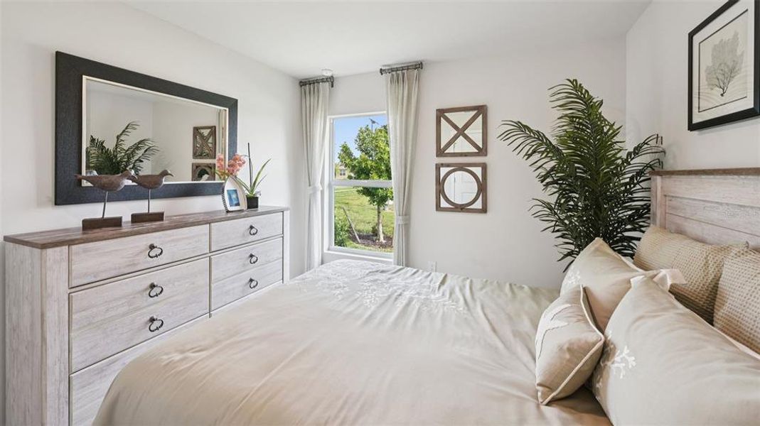 Furnished interior view inside a new home in Cove at West Port - Express, Port Charlotte (Image 24).