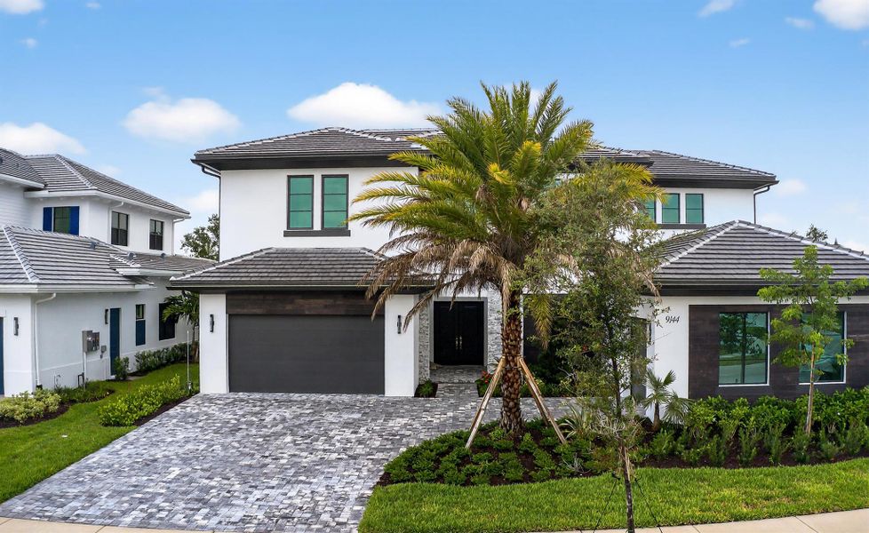 Front exterior of a new home in , Palm Beach Gardens, FL, highlighting curb appeal (Image 29).