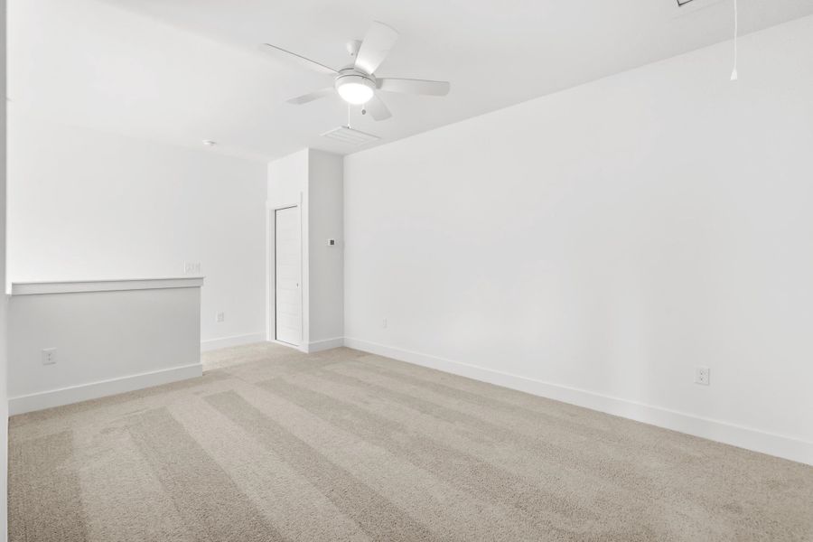 Spacious, unfurnished interior of a new home in Long Bay Golf Club, Longs (Image 33).