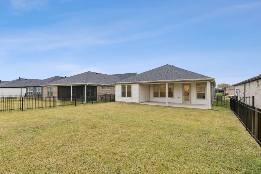 Exterior details and patio area of a home in Del Webb Fulshear, Fulshear (Image 3).