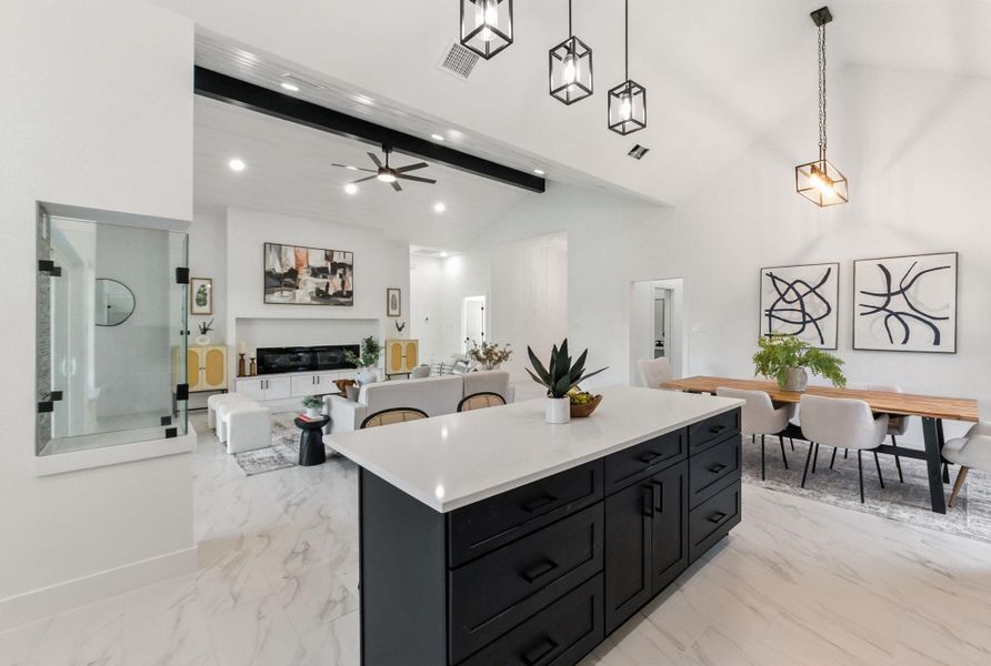 Kitchen featuring a mid-sized island