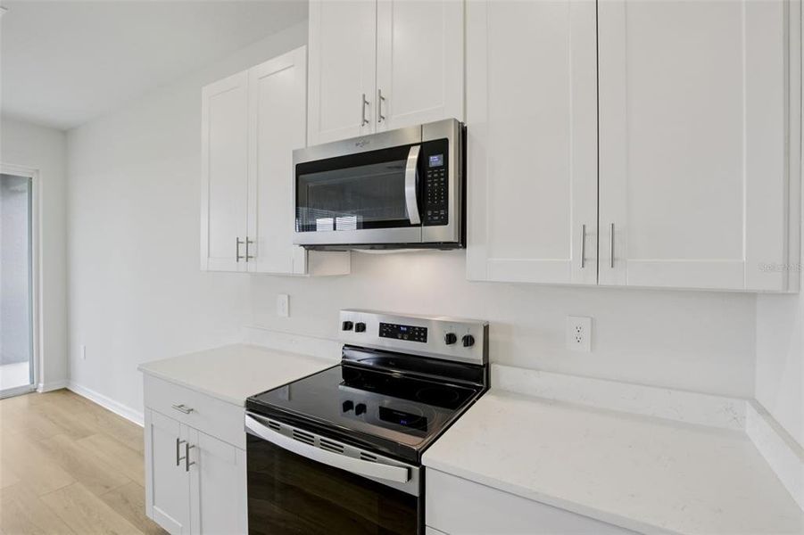 Furnished interior view inside a new home in Coasterra - Reserve Series, Palmetto (Image 17).