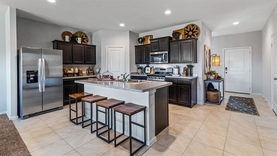 Kitchen -All Home and community information, including pricing, included features, terms, availability and amenities, are subject to change at any time without notice or obligation. All Drawings, pictures, photographs, video, square footages, floor plans, elevations, features, colors and sizes are approximate for illustration purposes only and will vary from the homes as built.