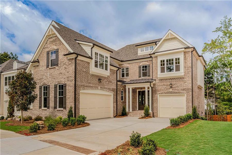 Front exterior of a new home in Bellwyn, Johns Creek, GA, highlighting curb appeal (Image 25).