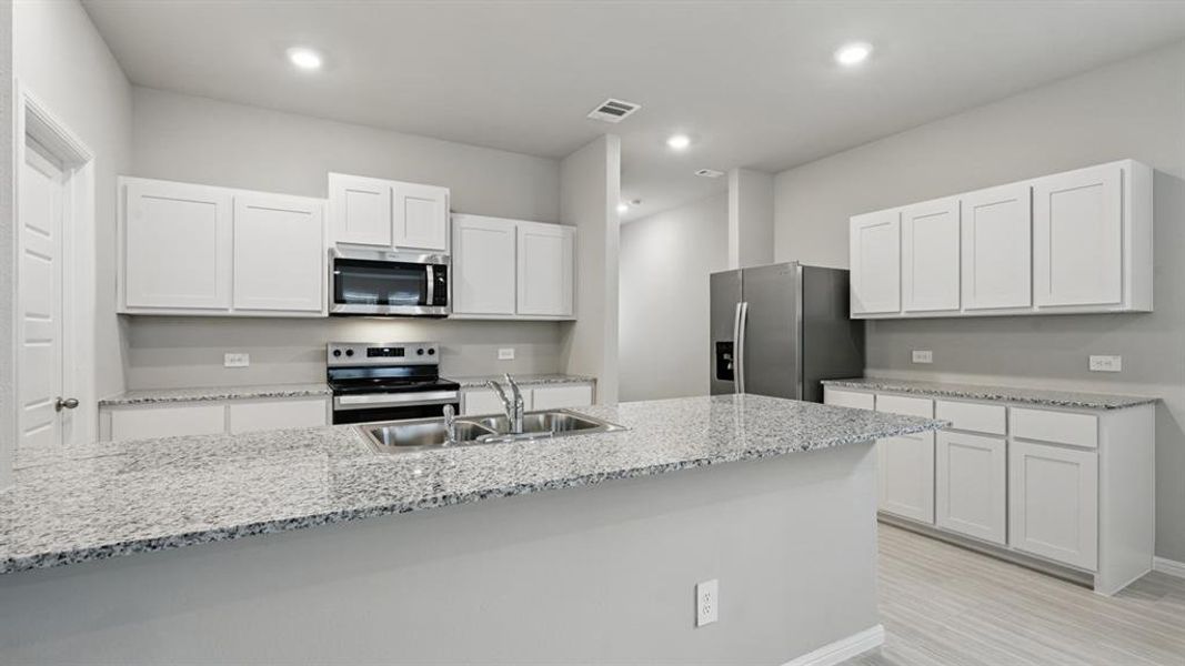 Kitchen - All Home and community information, including pricing, included features, terms, availability and amenities, are subject to change at any time without notice or obligation. All Drawings, pictures, photographs, video, square footages, floor plans, elevations, features, colors and sizes are approximate for illustration purposes only and will vary from the homes as built. Kitchen - All Home and community information, including pricing, included features, terms, availability and amenities, are subject to change at any time without notice or obligation. All Drawings, pictures, photographs, video, square footages, floor plans, elevations, features, colors and sizes are approximate for illustration purposes only and will vary from the homes as built.