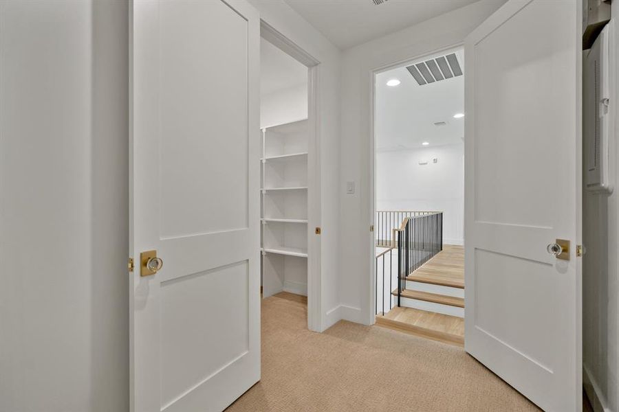 Just off of the 2nd floor landing is a pair of closets offering unbeatable air conditioned space for all of your miscellaneous storage needs.