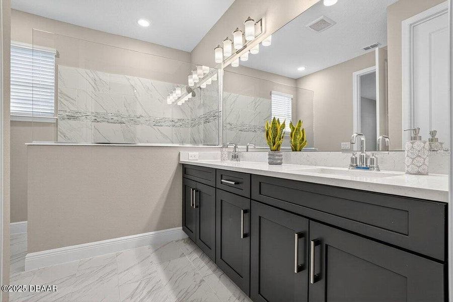 Furnished interior view inside a new home in Legends Preserve - Reserve Series, Daytona Beach (Image 8). Furnished interior view inside a new home in Legends Preserve - Reserve Series, Daytona Beach (Image 8).