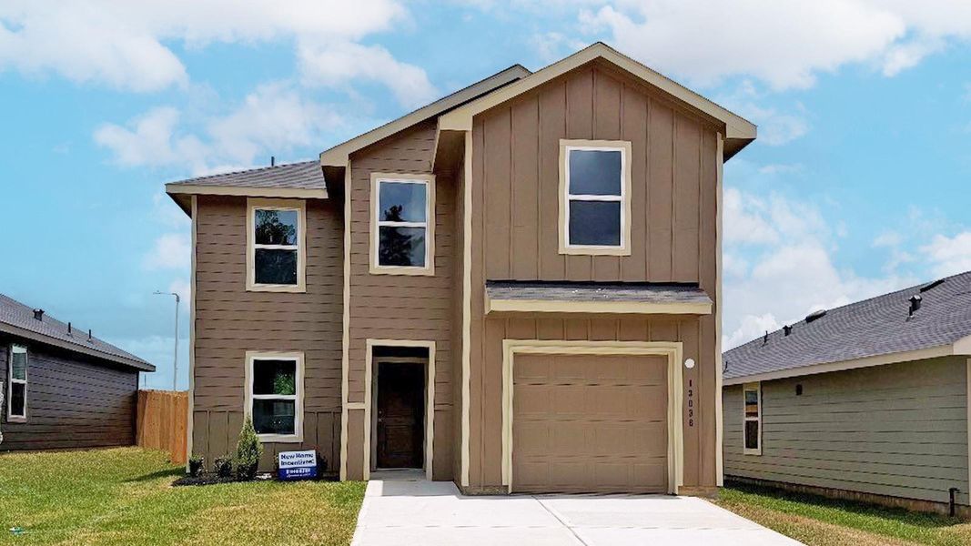 Front exterior of a new home in McCrorey Trails, Conroe, TX, highlighting curb appeal (Image 1). Front exterior of a new home in McCrorey Trails, Conroe, TX, highlighting curb appeal (Image 1).