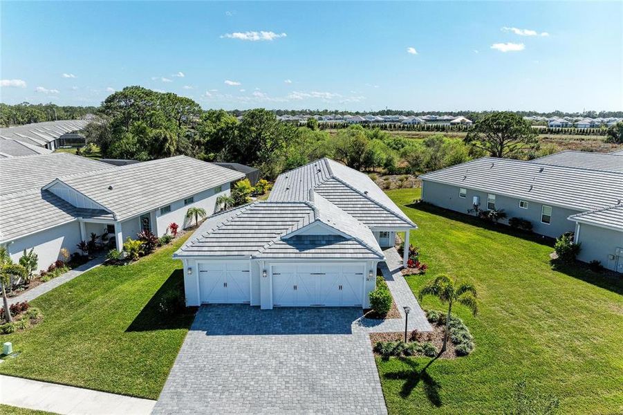 Front exterior of a new home in , Sarasota, FL, highlighting curb appeal (Image 2). Front exterior of a new home in , Sarasota, FL, highlighting curb appeal (Image 2).