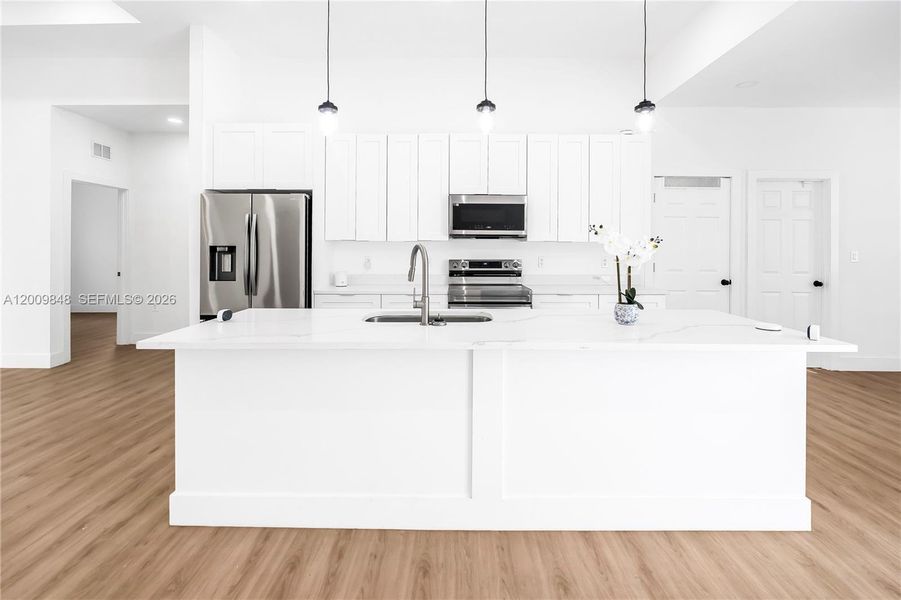 Furnished interior view inside a new home in , Clewiston (Image 12).