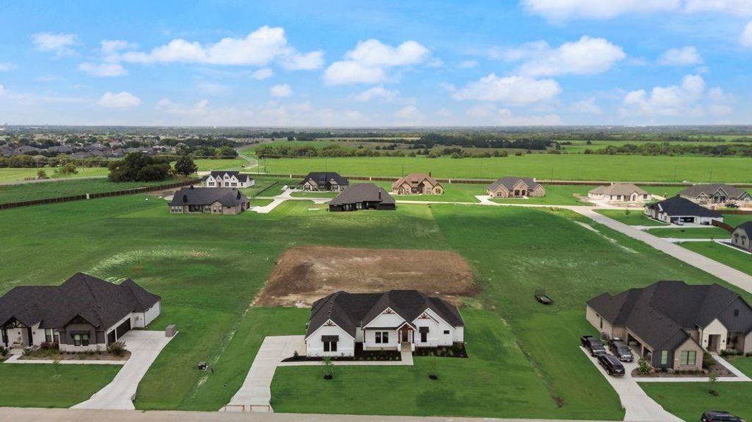 Overview of rural landscape featuring nearby suburban area Overview of rural landscape featuring nearby suburban area