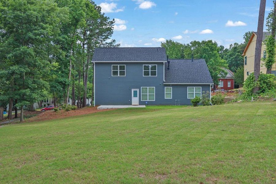 Front exterior of a new home in , Lawrenceville, GA, highlighting curb appeal (Image 19).