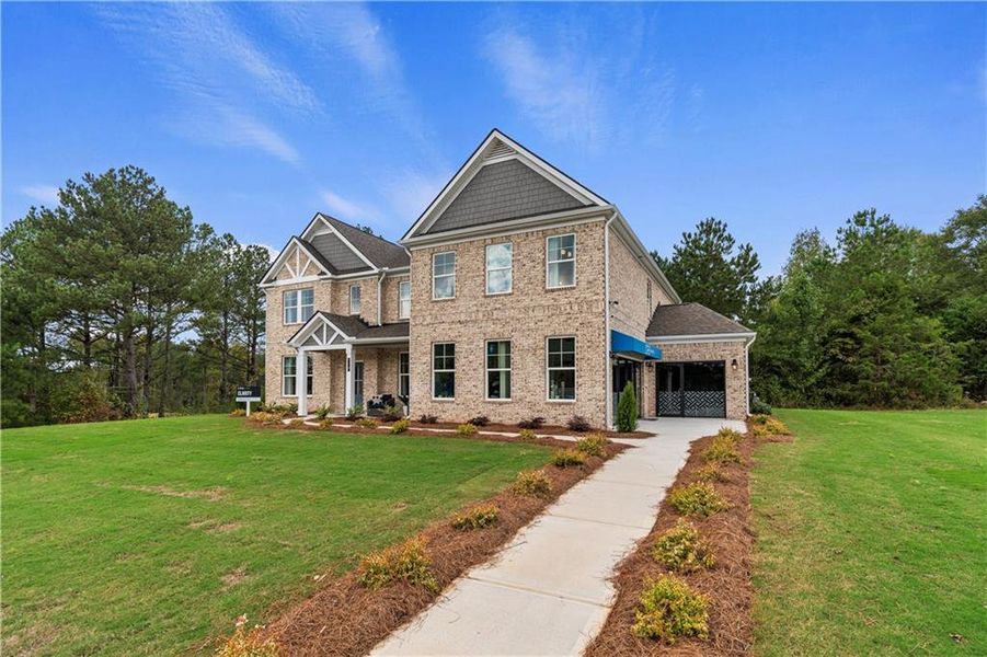 Front exterior of a new home in Trinity Park, McDonough, GA, highlighting curb appeal (Image 21).