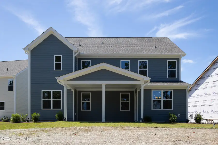 Exterior details and patio area of a home in Terrapin, Leland (Image 4).