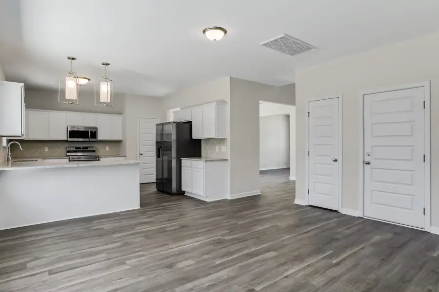 Representative unfurnished interior of a home built from the The Cedar Creek by RTS Homes in Grand Reserve, Hinesville (Image 15).