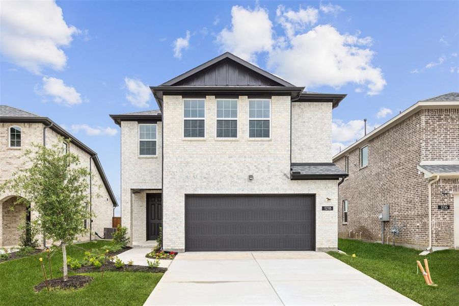 Front exterior of a new home in Santorini, Seagoville, TX, highlighting curb appeal (Image 20).