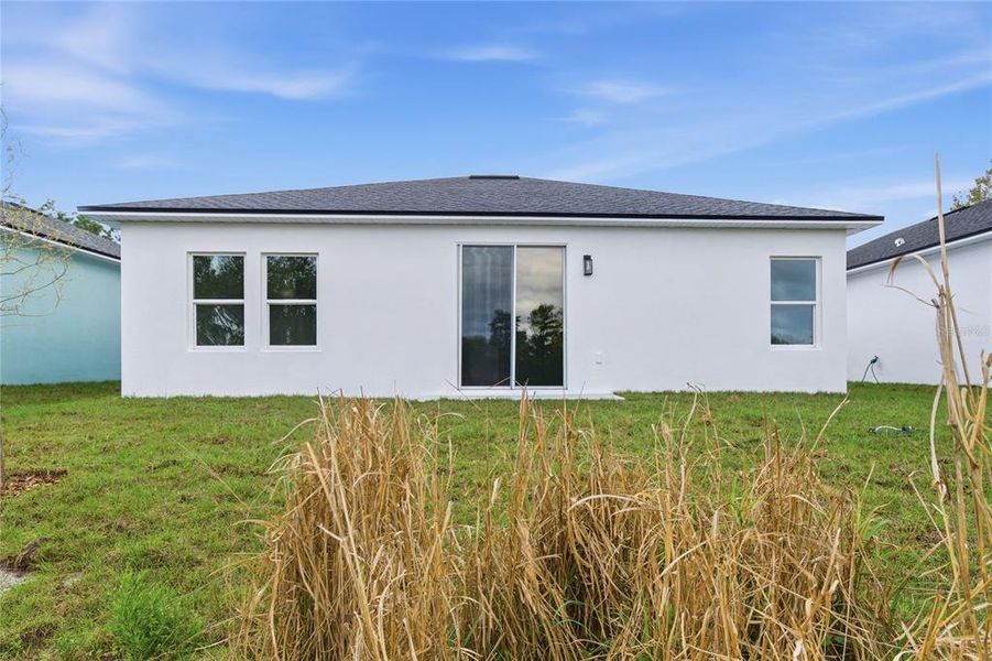 Exterior details and patio area of a home in , Osteen (Image 30).