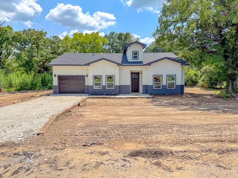 Front exterior of a new home in , Fairfield, TX, highlighting curb appeal (Image 16). Front exterior of a new home in , Fairfield, TX, highlighting curb appeal (Image 16).