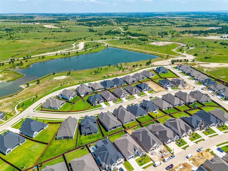 Aerial view of residential area with a large body of water Aerial view of residential area with a large body of water
