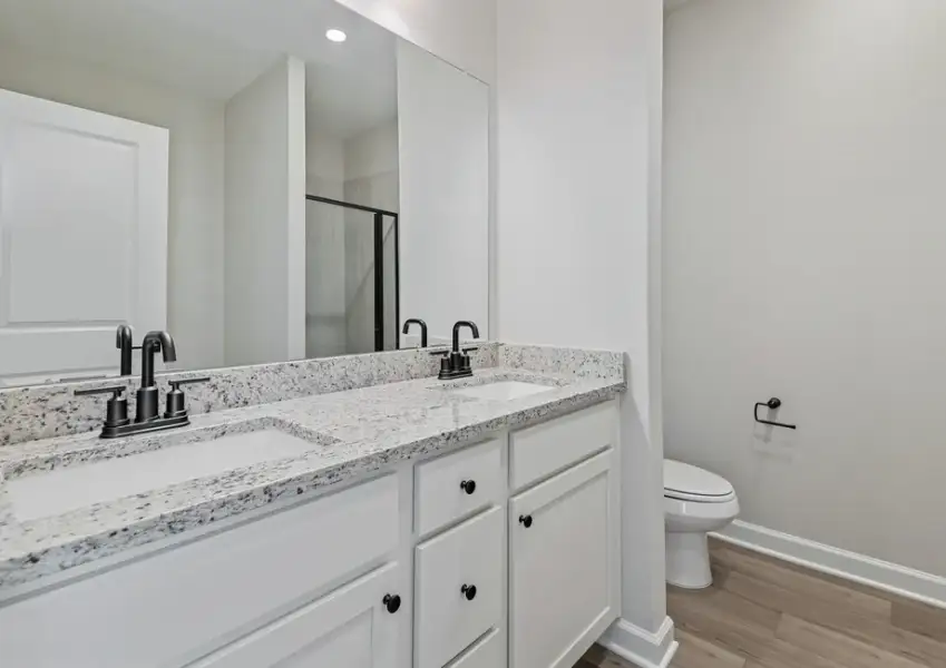 Mater bathroom with a large vanity